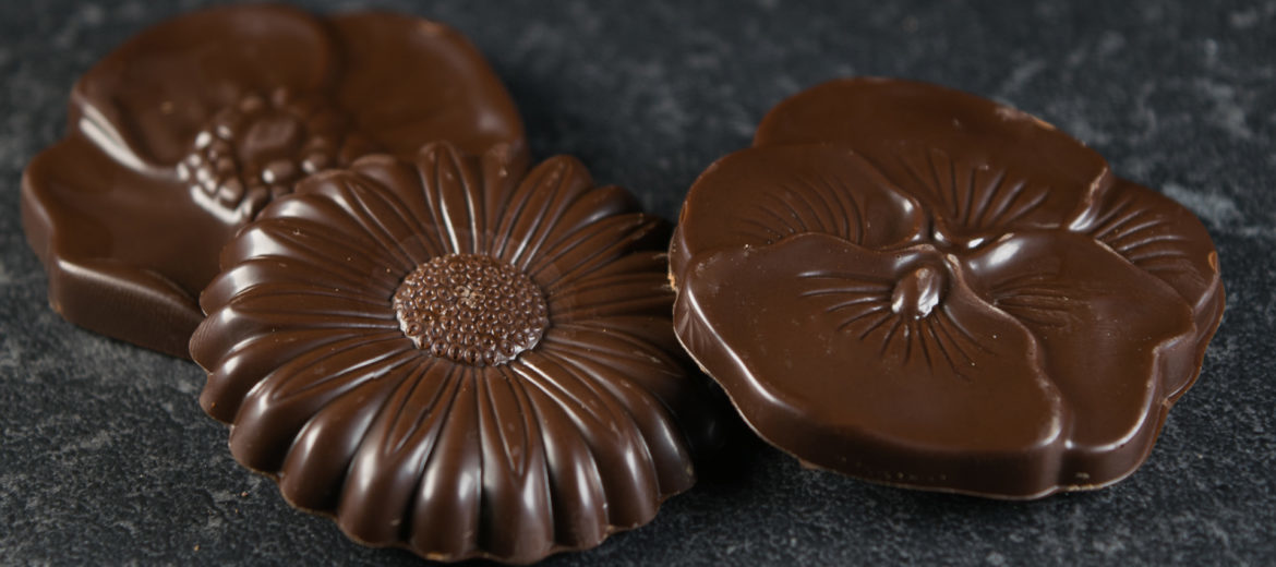 Handmade daisy in dark couverture